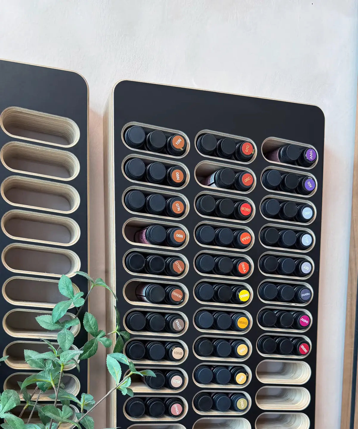 HUEBAR wall-mounted hair color organizer in a professional salon color bar