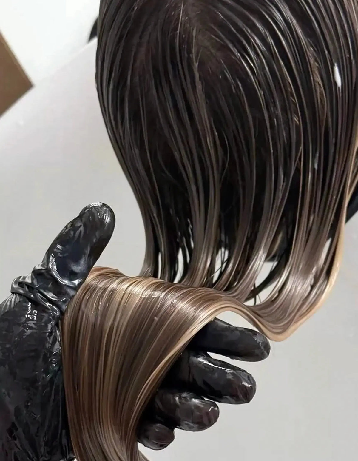 hair color toning at the salon sink
