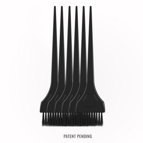 Black hair color application brush with soft bristles on a white background