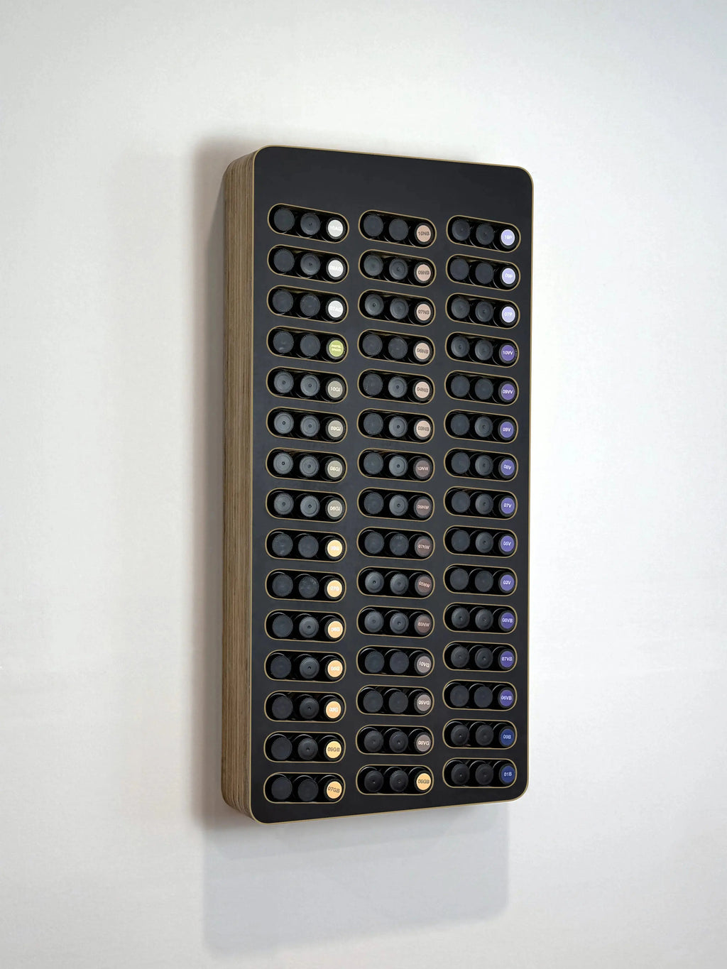 Black wood MCM hair color display that organizes and manages L'Oreal  Shades Eq bottles with easy color formula labeling