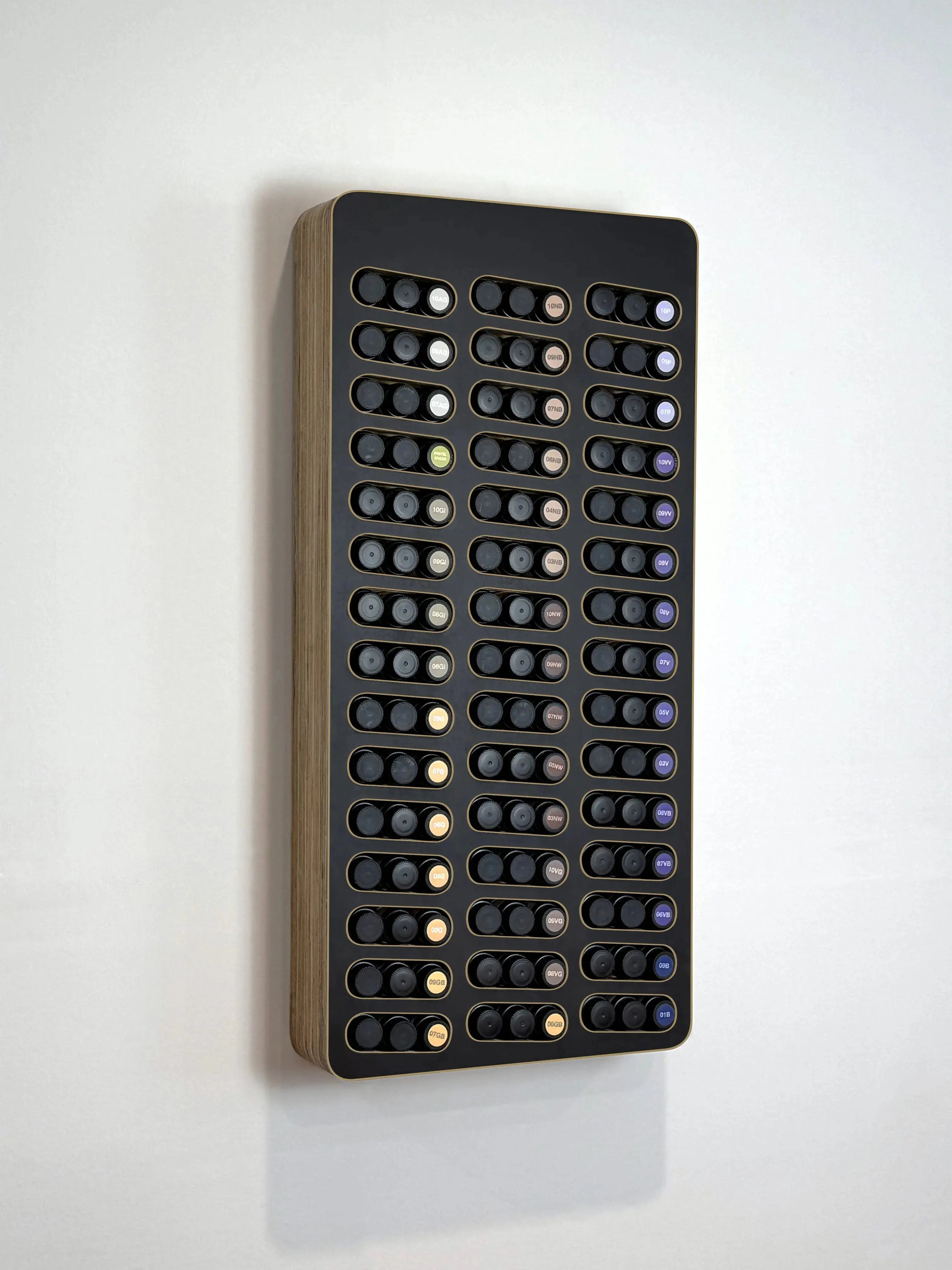 Black wood MCM hair color display that organizes and manages L'Oreal  Shades Eq bottles with easy color formula labeling