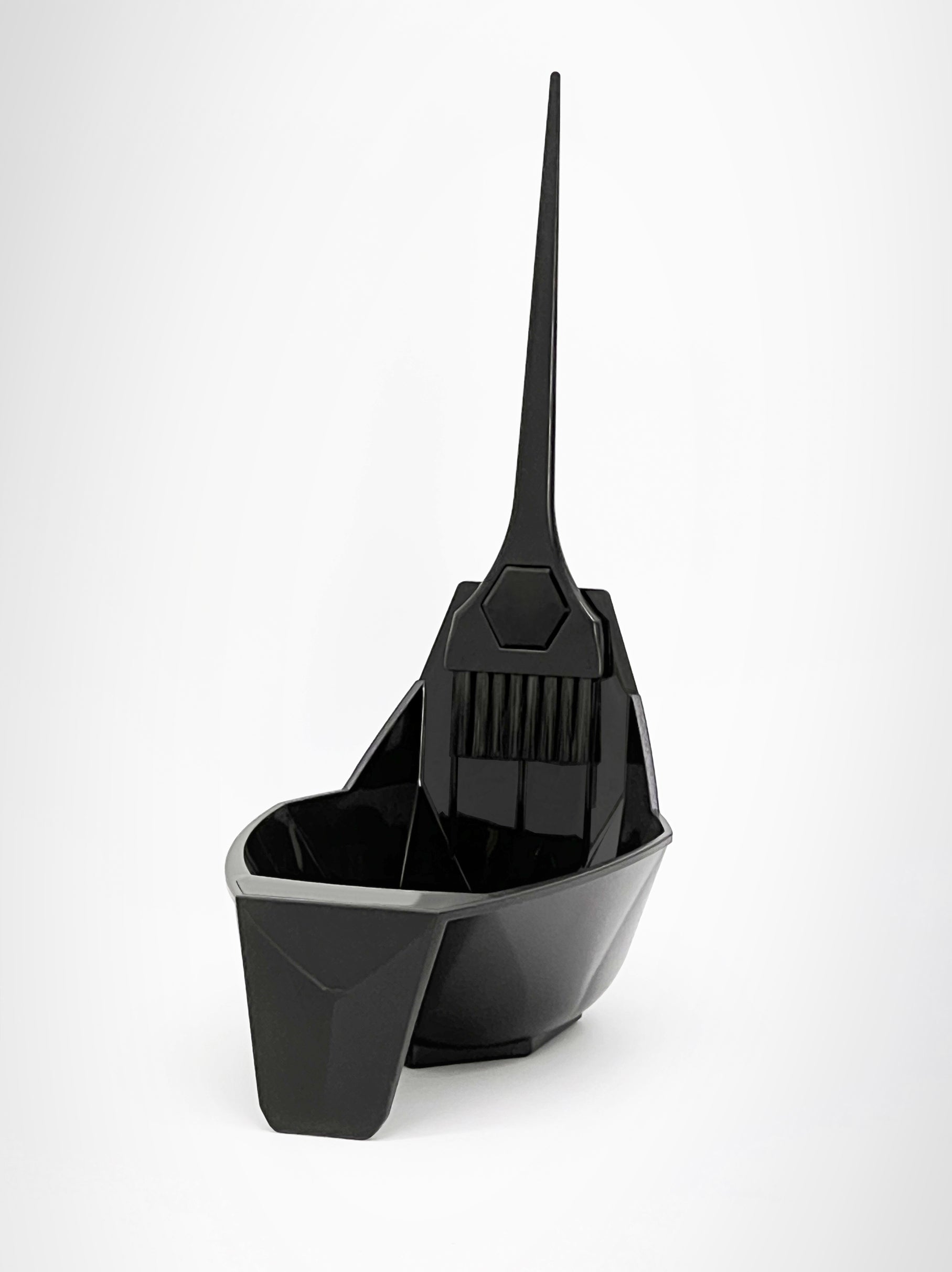 Black Magnetic hair color bowl and brush on white background