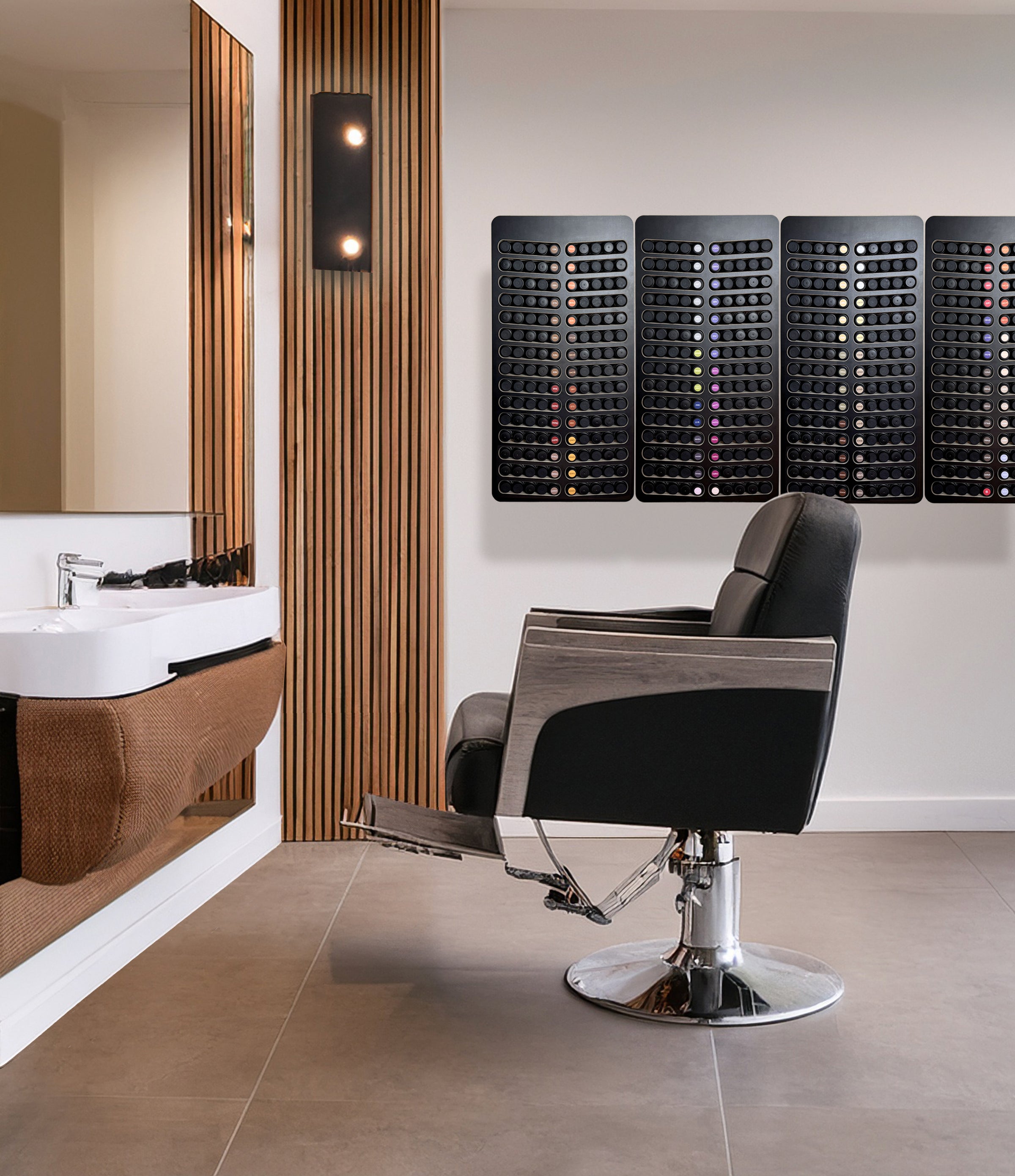 Modern salon interior with a black salon chair, sink, and decorative wall panels. with Black Shades Eq Hair Color organizers.