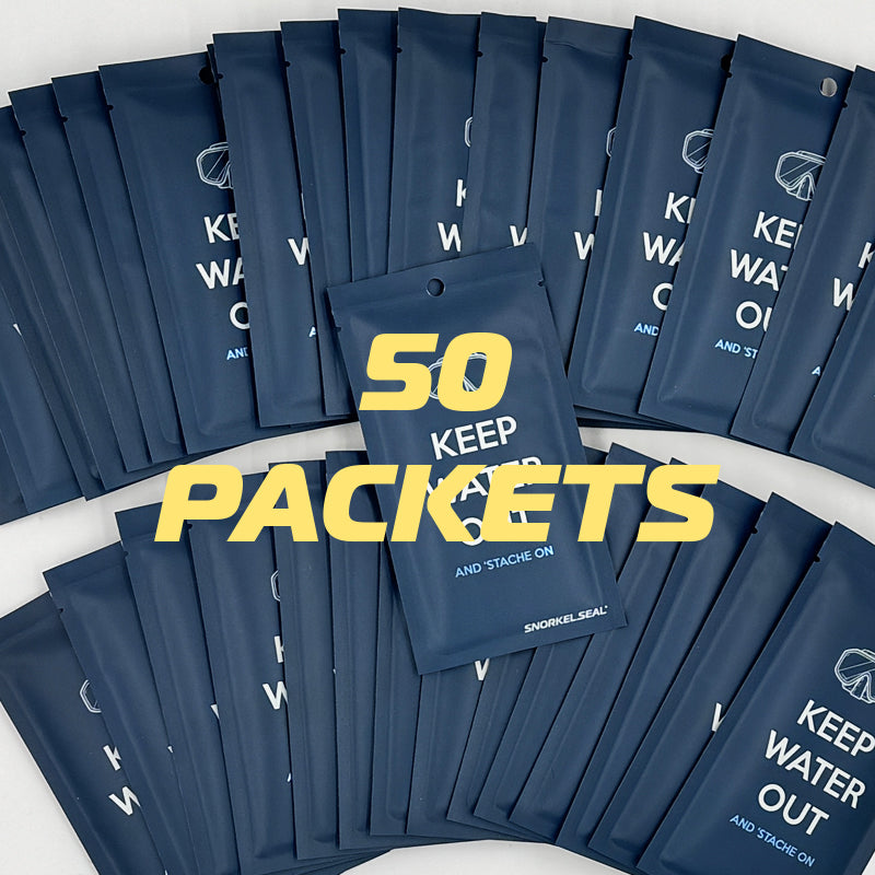 Multiple blue mustache barrier packages with text on a white background