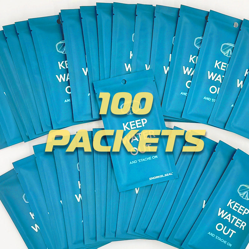100 blue Snorkel Seal mustache baarrier  packets with  'Keep Water Out Packets' text on a white background